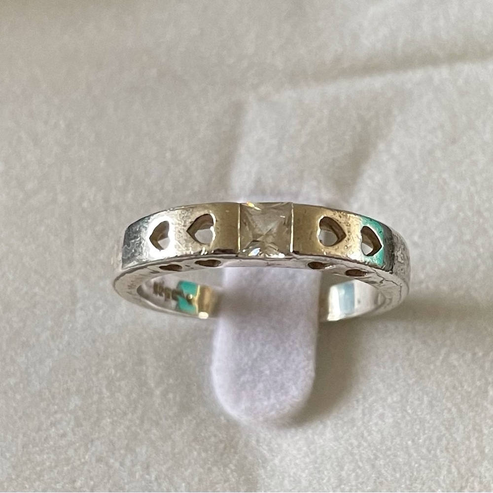 Sterling silver band square cubic zirconia flanked by hearts